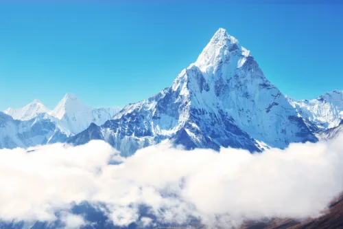 The current measurement of Mount Everest indicates that it is larger than the previous measurement.